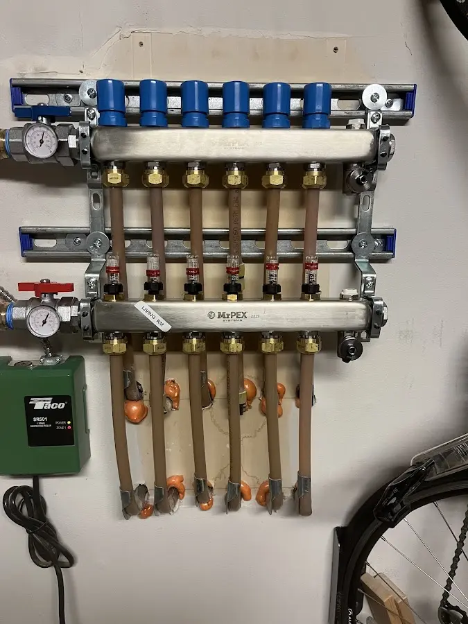 Plumber performing Water Heater Repair at a residential property in Highland Acres